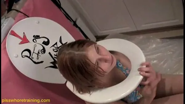 XXX Teen piss whore Dahlia licks the toilet seat clean fresh Movies